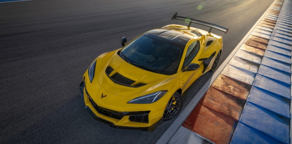 Yellow 2025 Chevrolet Corvette ZR1 driving above-view on a road.