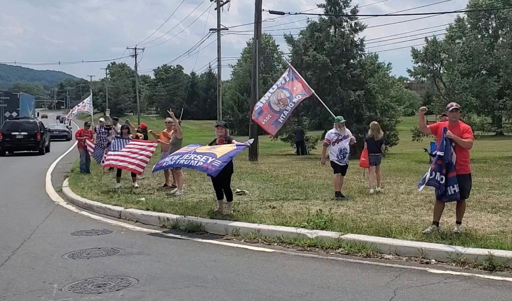 Supporters braved the 90-degree heat to show their love for Trump.