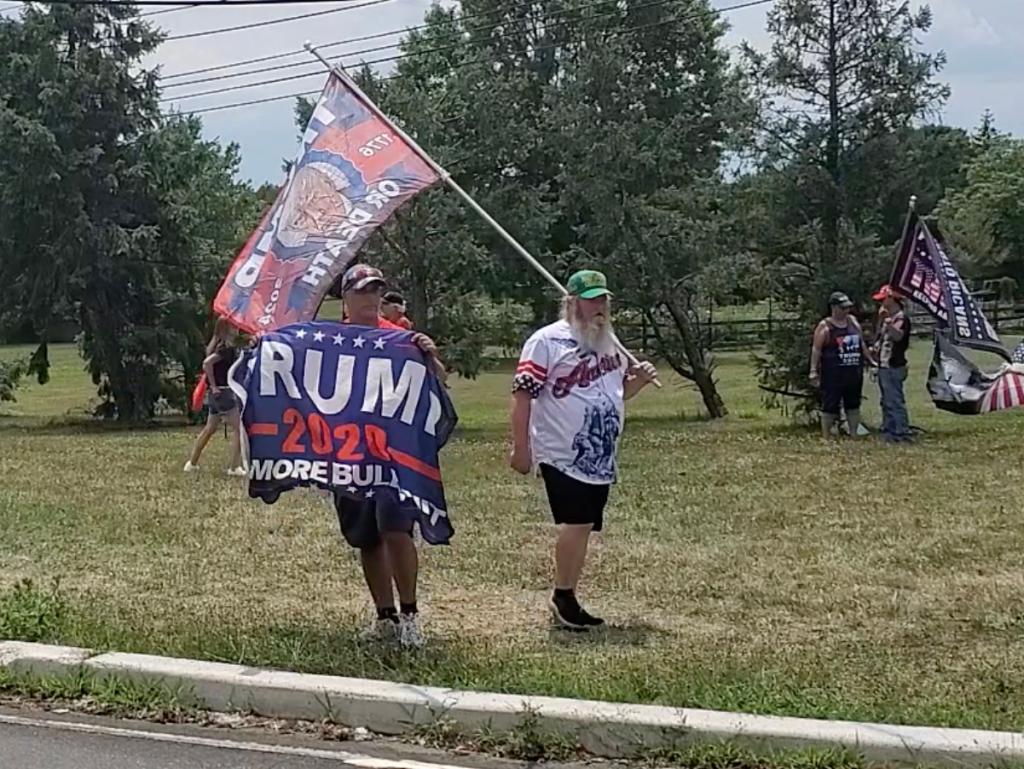 Trump supporters lined the street outside Trump's Bedminster golf club.