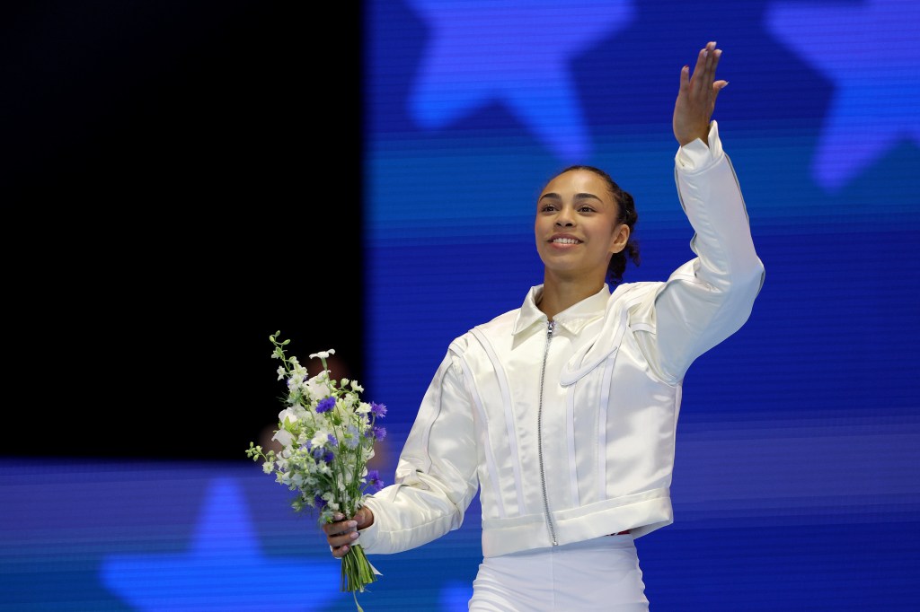 Hezly Rivera reacting joyfully after being selected for the 2024 U.S. Olympic Women's Gymnastics Team in Minneapolis, Minnesota