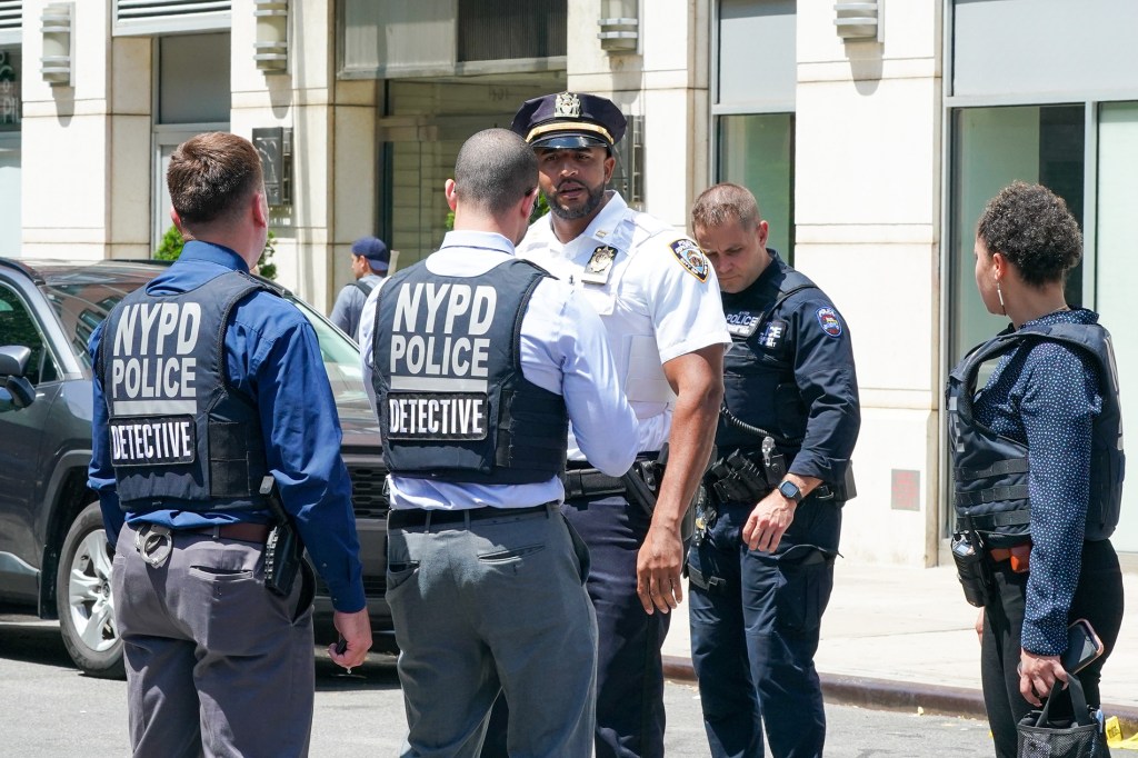 Seated driver of vehicle (van) in front, parked at scene spoke with NYPD