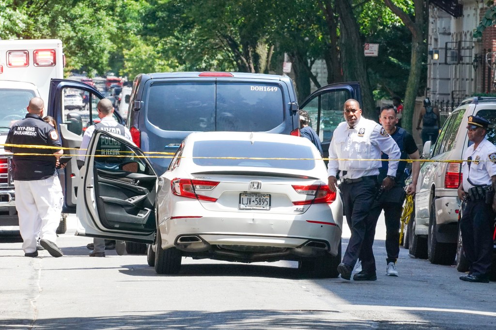 Seated driver of vehicle (van) in front, parked at scene spoke with NYPD