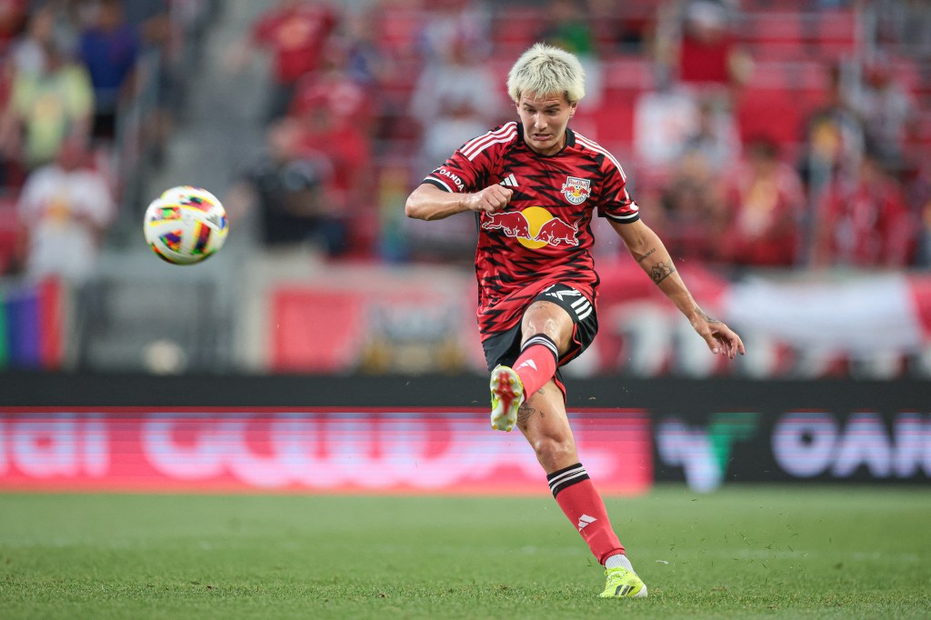 New York Red Bulls defender John Tolkin (47) kicking the ball during a soccer game against D.C. United at Red Bull Arena, New Jersey