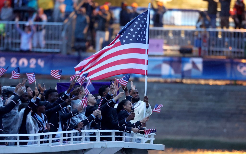 LeBron James seemed to enjoy himself as the male flagbearer for Team USA during the opening ceremony of the Paris Olympics.