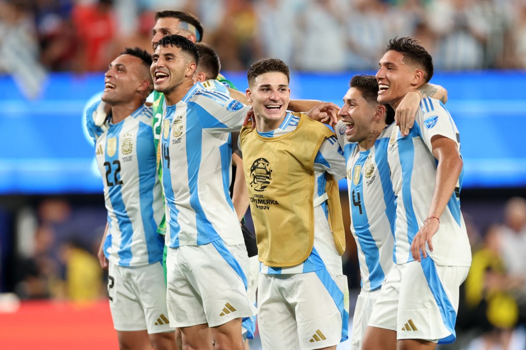 Argentina players celebrate after their win over Canada.