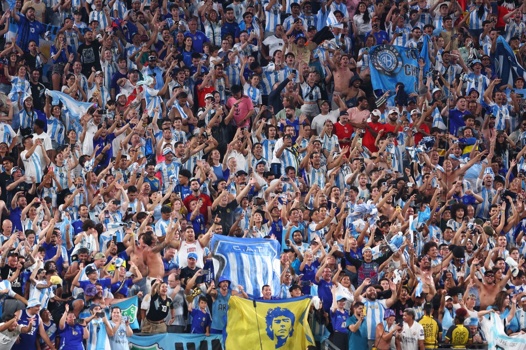 Argentina fans celebrate during their win over Canada.