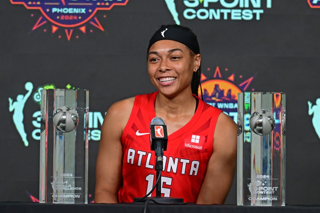 Allisha Gray talks to the media after winning the Skills Challenge and Three-Point Contest at the Footprint Center in Phoenix, Arizona.