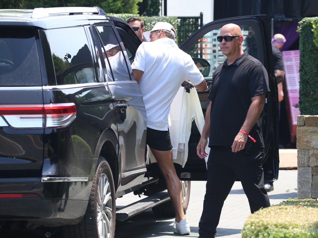 Tom Brady arrives to Michael Rubin's home in Bridgehampton, New York to pick up his "White" outfit for today's July 4 Party.