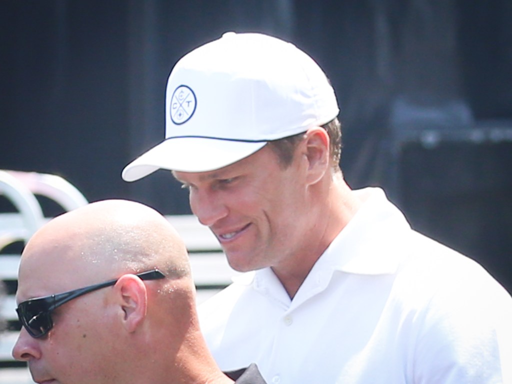 Tom Brady arrives to Michael Rubin's home in Bridgehampton, New York to pick up his 'White' outfit for today's July 4th Party