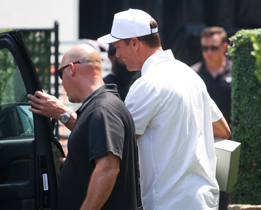 Tom Brady arrives to Michael Rubin's home in Bridgehampton, New York to pick up his 'White' outfit for today's July 4th Party