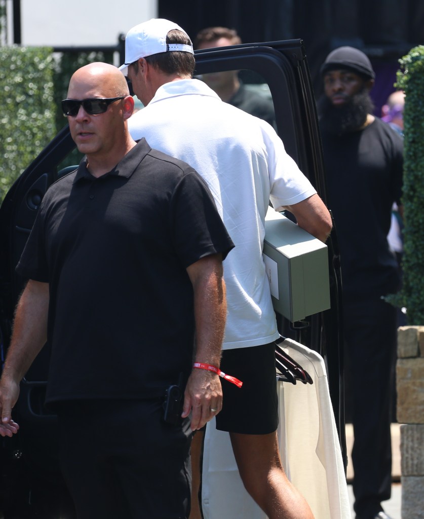 Tom Brady arrives to Michael Rubin's home in Bridgehampton, New York to pick up his "White" outfit for today's July 4 Party.