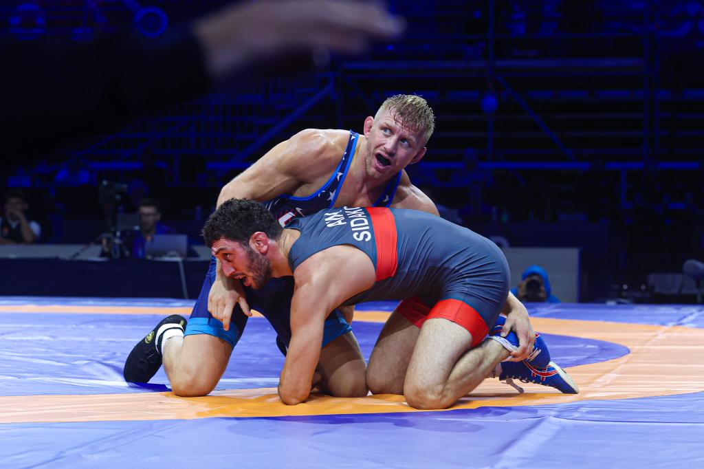 Zaurbek Sidakov and Kyle Douglas Dake in a Men's Freestyle 74kg weight gold medal wrestling match at the Senior World Championships in Belgrade, 2023