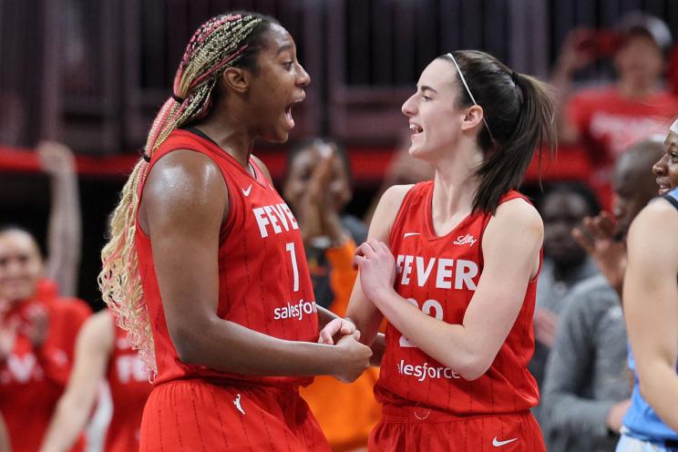 Aliyah Boston #7 and Caitlin Clark #22 of the Indiana Fever celebrate against the Chicago Sky at Gainbridge Fieldhouse on June 01, 2024 in Indianapolis, Indiana.