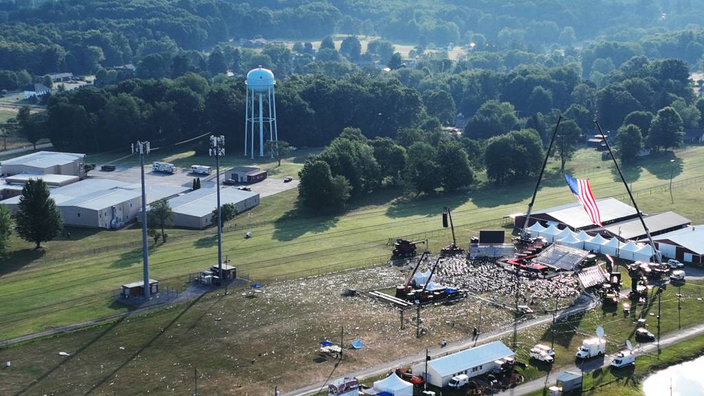 The clearing of Fennell's yard can be seen in the top right, next door to the rally grounds and the AGR factory lot.  