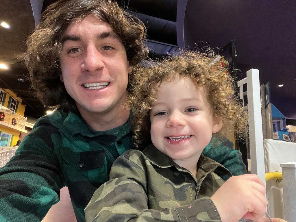 Harrison Tinsley taking a selfie with his son Sawyer after winning custody