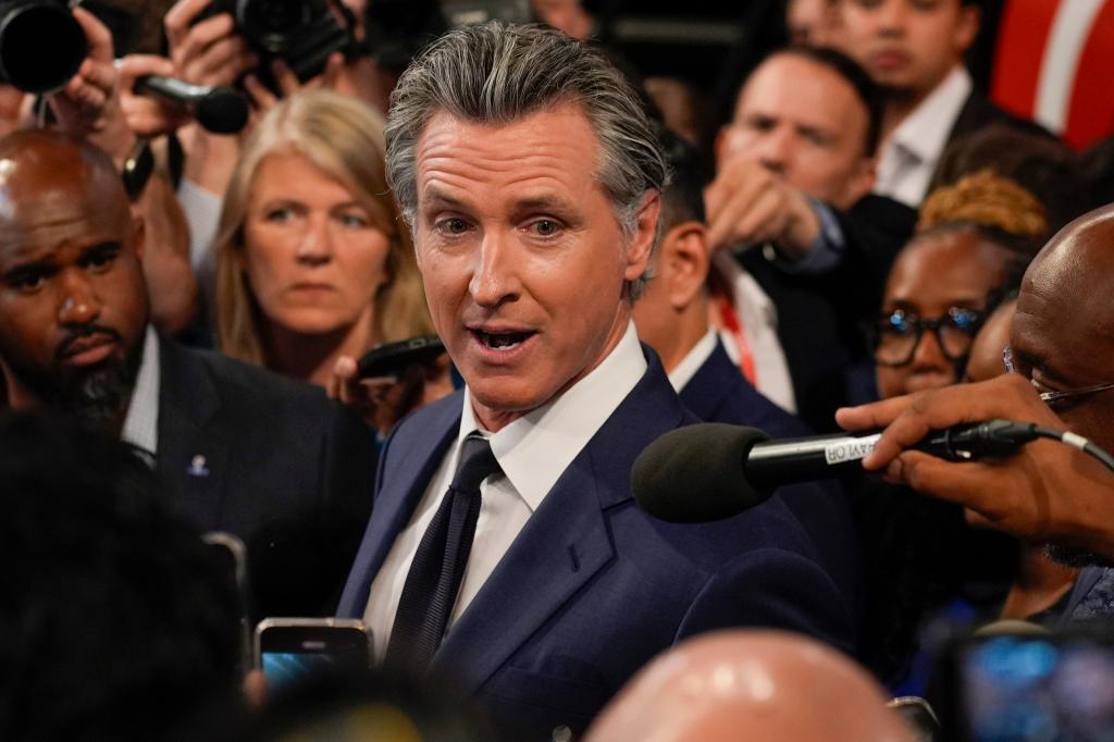California Gov. Gavin Newsom speaks to reporters after a presidential debate between President Joe Biden and Republican presidential candidate former President Donald Trump in Atlanta, Thursday, June 27, 2024. 
