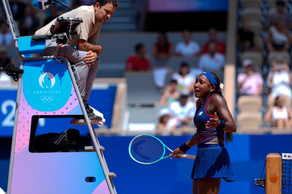 Coco Gauff argues with an umpire during her Olympics loss on July 30, 2024.