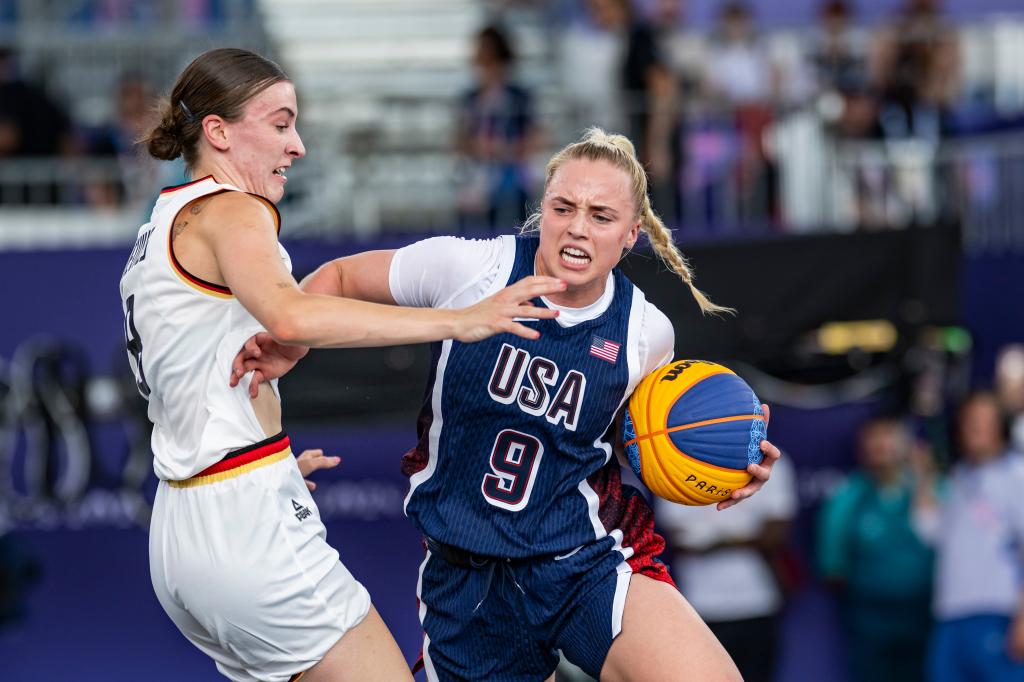 Elisa Mevius of Team Germany and Hailey van Lith of Team USA in action during the Women's Pool Round match between Germany and United States of America on day four of the Olympic Games Paris 2024 at the Esplanade Des Invalides on July 30, 2024 in Paris, France.