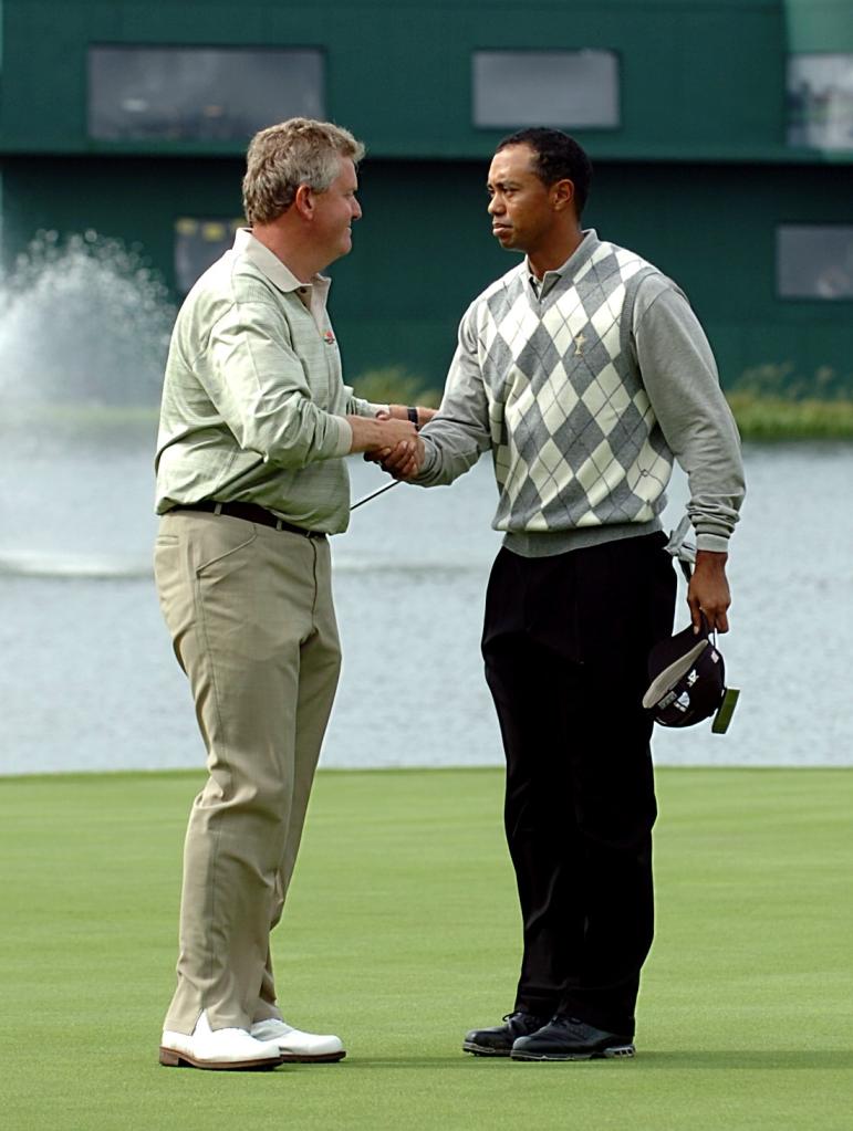 Tiger Woods and Colin Montgomerie shaking hands at the 36th Ryder Cup at The K Club, Straffan, Ireland in 2006