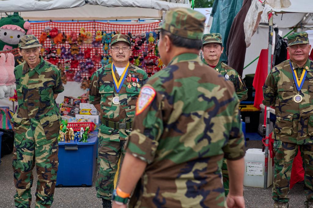 Former Hmong soldiers during the US conflict in Vietnam prepare for a visit by Second Gentleman of the United States Douglas Emhoff during the Hmong Festival in Wausau, Wisconsin, Saturday, July 27, 2024.