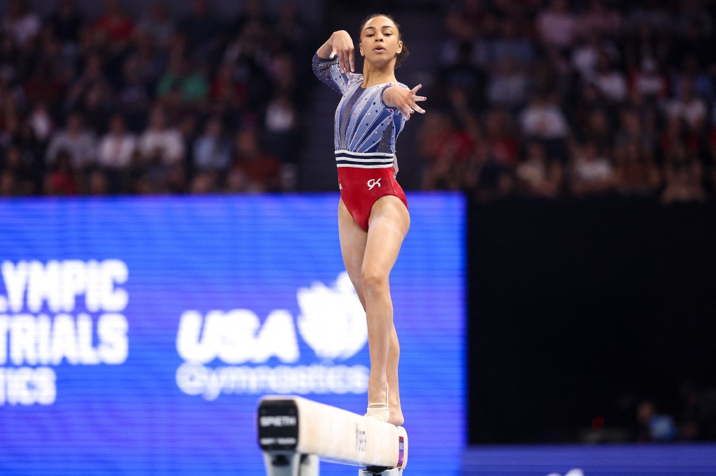 Hezly Rivera competing on the balance beam during the 2024 U.S. Olympic Team Gymnastics Trials in Minneapolis, Minnesota