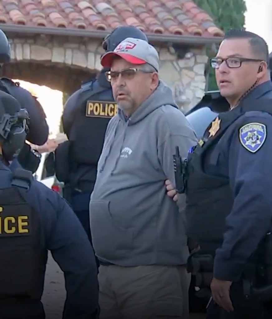 A man in a cap accompanied by police officers, related to news story about a rich mother involved in organized crime