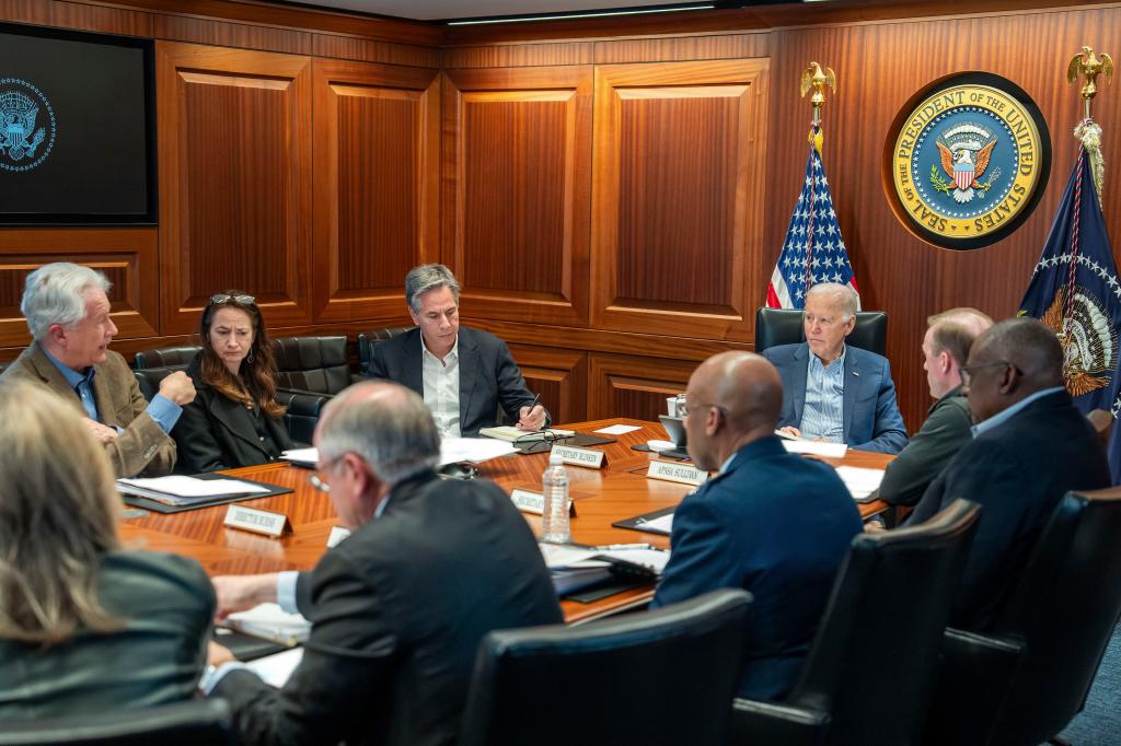 Biden and members of his national security team receive an update to an ongoing airborne attack on Israel from Iran in April. 