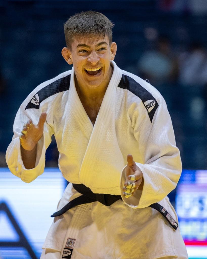 Young judoka Jack Yonezuka in a white uniform, the youngest member of the US Olympic Judo team