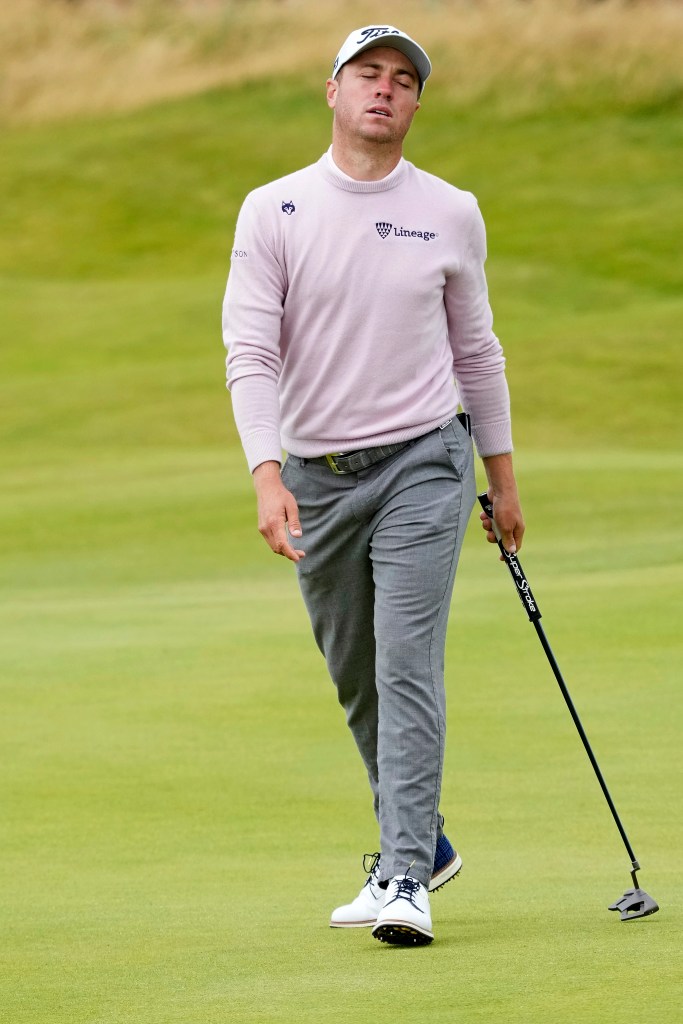 Justin Thomas reacts to his putt on the fourth green during the final round of the Open Championship golf tournament at Royal Troon.