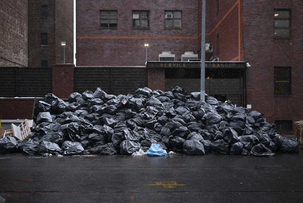 Large pile of trash seen on the sidewalk on East 14th street in Midwood Brooklyn