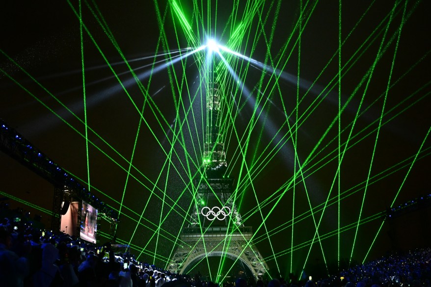 The Eiffel Tower is illuminated during the opening ceremony.