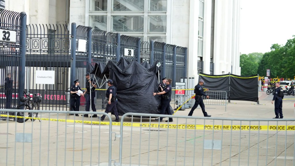 Police block off spot where Brady fell.