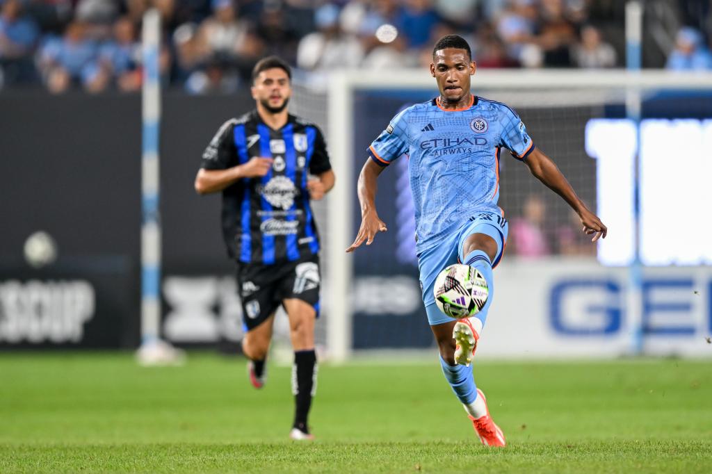 New York City FC defender Christian McFarlane (18) controls the ball during the first half against Queretaro FC at Yankee Stadium on July 28, 2024.