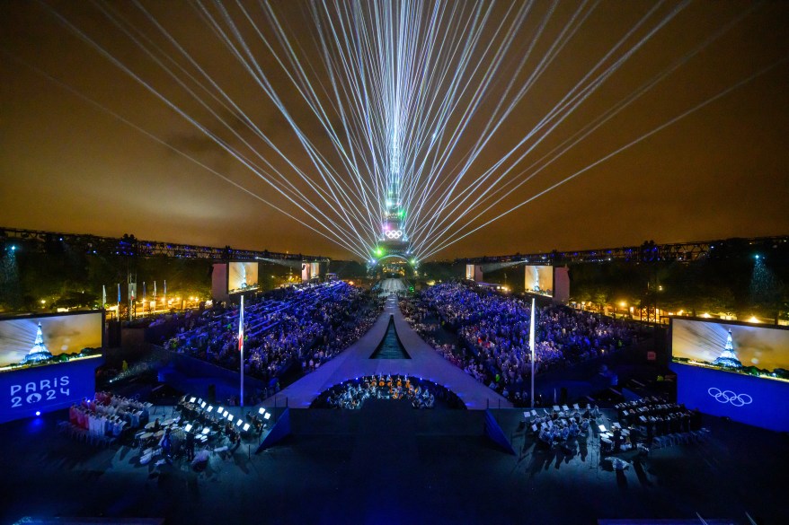 The Eiffel Tower is illuminated during the opening ceremony.