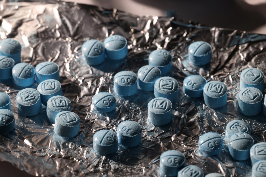 Pills are seen pressed from a pill press at Reuters' office in New York City, U.S., June 24, 2024. 