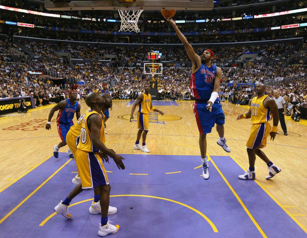 Rasheed Wallace #30 of the Detroit Pistons shoots a layup against the Los Angeles Lakers in Game two of 2004 NBA Finals at Staples Center on June 8, 2004 in Los Angeles, California.  The Lakers won 99-91. 