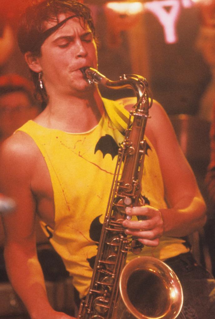 Rob Lowe plays saxophone in a scene from the film "St. Elmo's Fire," 1985.