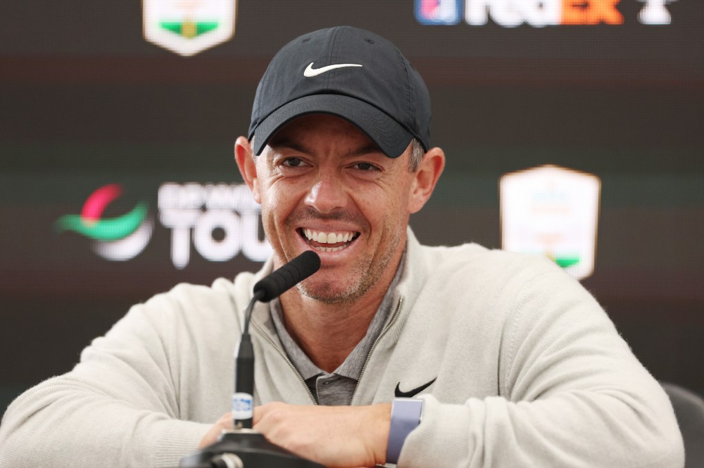 Rory McIlroy of Northern Ireland laughing during a press conference at the Genesis Scottish Open