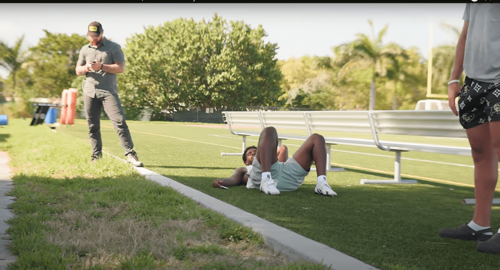 Shedeur Sanders needed a water break after a Miami practice.