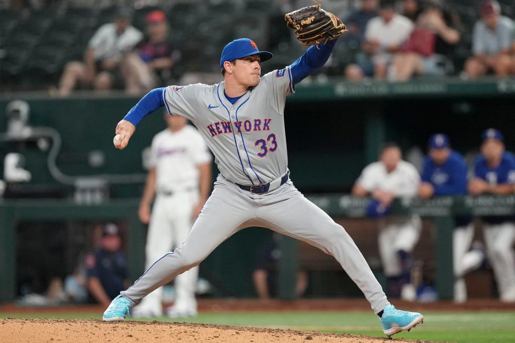 New York Mets relief pitcher Drew Smith (33) delivers a pitch to the Texas Rangers during the ninth inning at Globe Life Field. 