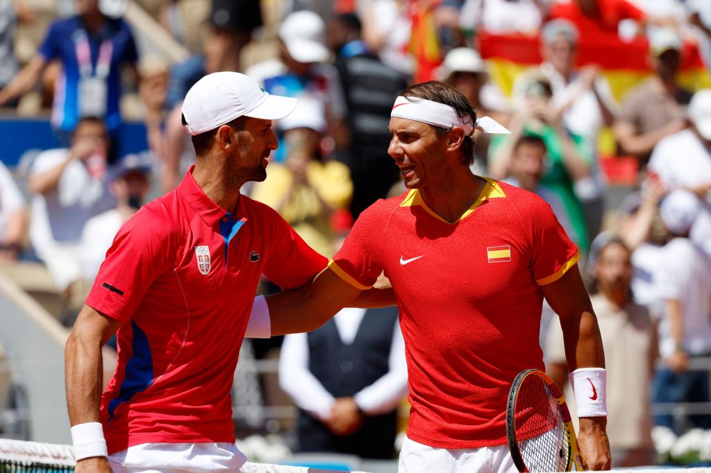 Rafael Nadal (R) of Spain and Novak Djokovic of Serbia greet each other ahead of their Men's Singles second round match on July 29, 2024.