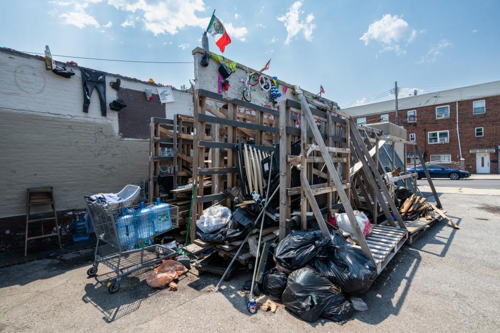 Homeless camp behind shuttered Rite Aid, Broadway and 47th Street, Queens. 