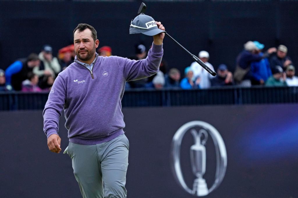 Thriston Lawrence acknowledges the gallery on the 18th green during the final round of the Open Championship golf tournament at Royal Troon.