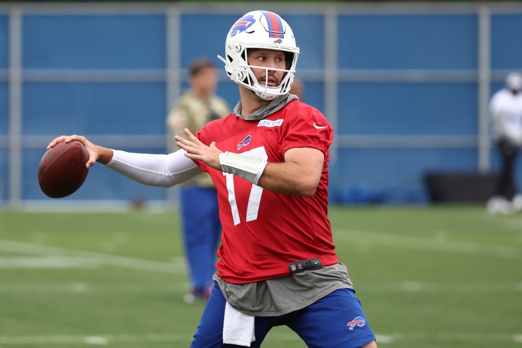 Buffalo Bills quarterback Josh Allen (17) throws a pass during NFL football practice in Orchard Park, N.Y., Tuesday, June 11, 2024.