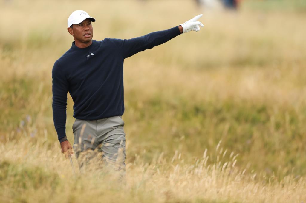 Tiger Woods gesturing after playing from the rough on the sixth hole during the British Open Golf Championships at Royal Troon golf club in Scotland.