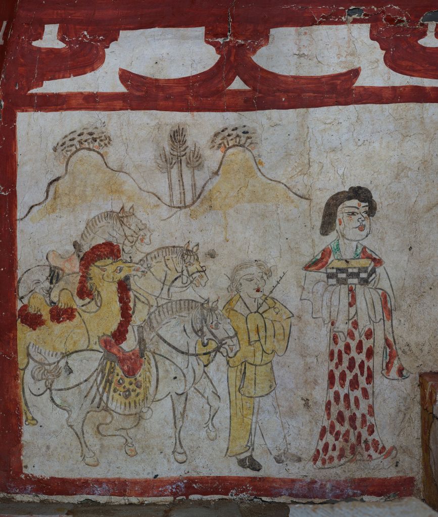 A painting of a man and a boy on horses, part of a well-preserved mural in a Tang Dynasty tomb excavated in Taiyuan, north China's Shanxi Province