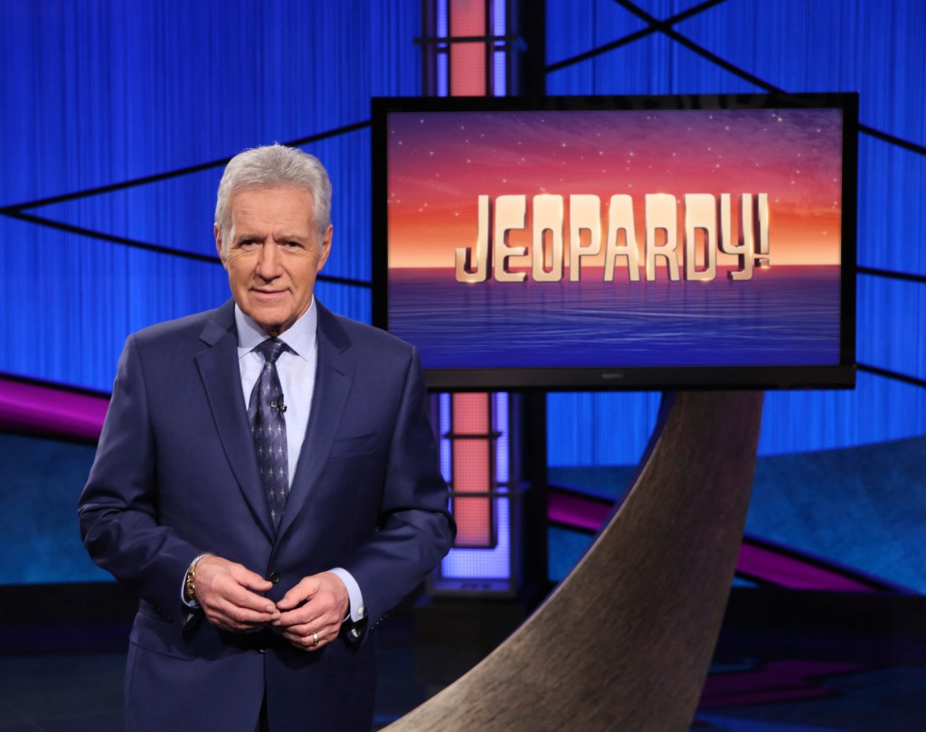 This image shows Alex Trebek on the set of "Jeopardy!" 