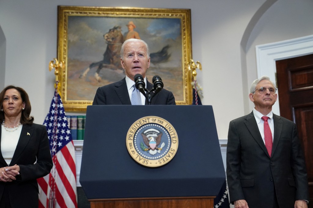 President Joe Biden is flanked by Vice President Kamala Harris and Attorney General Merrick Garland as he delivers a statement a day after Republican challenger Donald Trump was shot at a campaign rally, during brief remarks at the White House in Washington, U.S., July 14, 2024. 