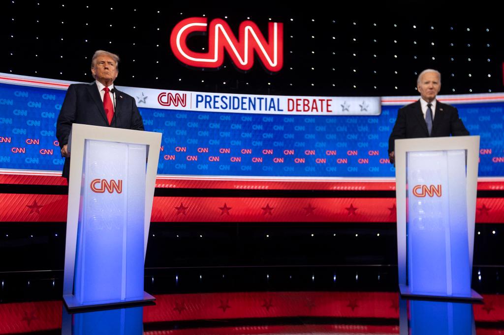 US President Joe Biden and former US President and Republican presidential candidate Donald Trump participate in the first presidential debate of the 2024 elections at CNN's studios in Atlanta, Georgia, on June 27, 2024. (Photo by CHRISTIAN MONTERROSA / AFP) (Photo by CHRISTIAN MONTERROSA/AFP via Getty Images)