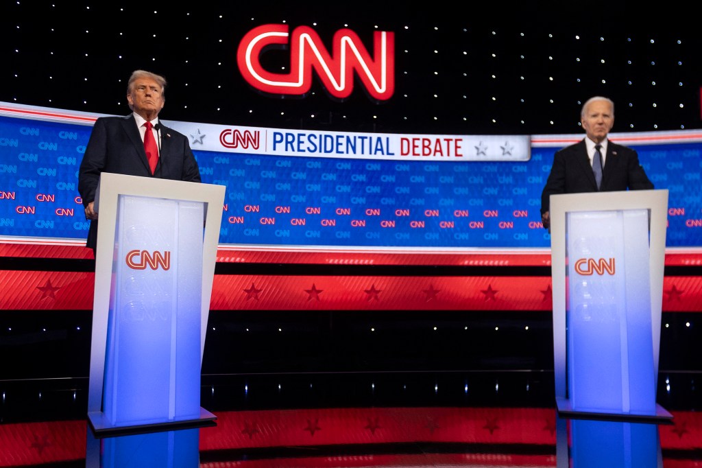 US President Joe Biden and former US President and Republican presidential candidate Donald Trump participate in the first presidential debate of the 2024 elections at CNN's studios in Atlanta, Georgia, on June 27, 2024. (Photo by CHRISTIAN MONTERROSA / AFP) (Photo by CHRISTIAN MONTERROSA/AFP via Getty Images)
